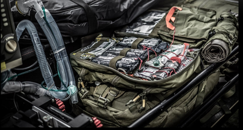 Close-up of organized medical supplies in tactical bag